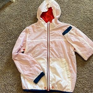 White windbreaker with red & blue trim